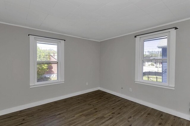 82 Grove St, North Brookfield, MA 01535 - spare room featuring ornamental molding, dark wood-style floors, and baseboards