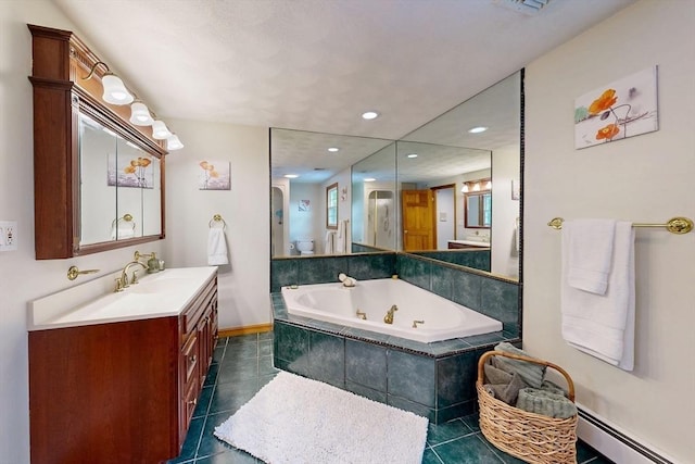 bathroom featuring baseboard heating, tile patterned flooring, a whirlpool tub, vanity, and recessed lighting