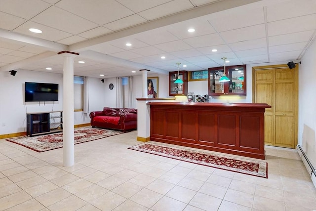 reception featuring recessed lighting, a paneled ceiling, and bar