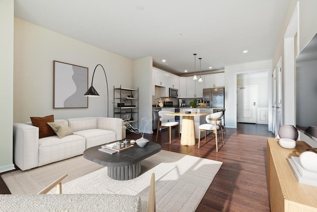 living room with dark wood-type flooring