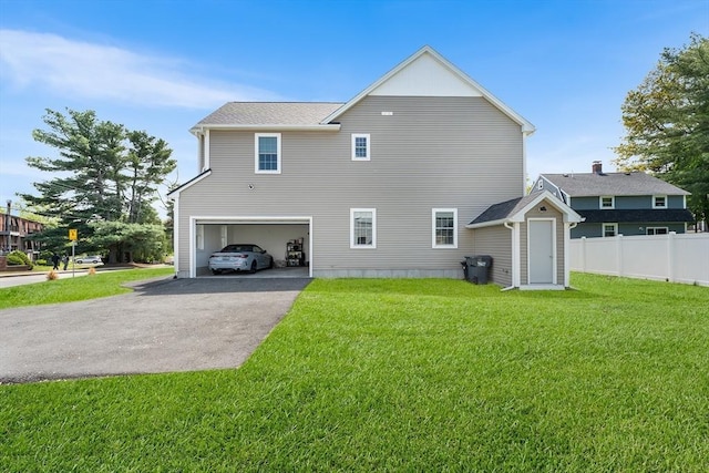 105 Depot St Unit A, Milford, MA 01757 - rear view of property with asphalt driveway and an attached garage