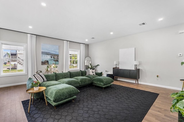 105 Depot St Unit A, Milford, MA 01757 - living room featuring wood finished floors, baseboards, and recessed lighting