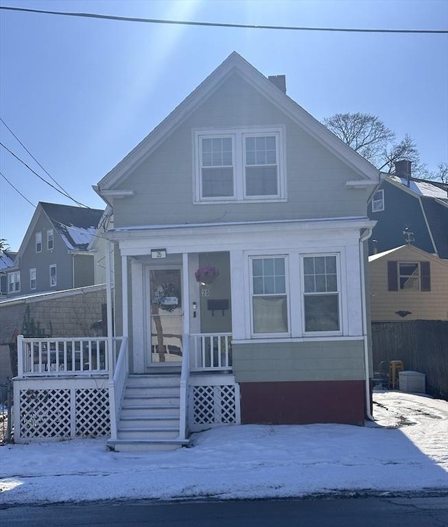 view of snow covered house