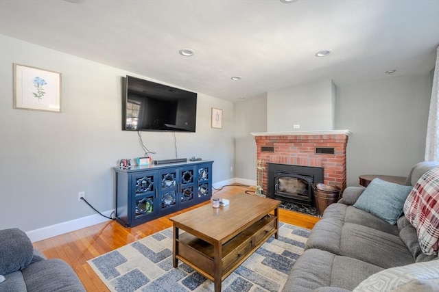 living room with light hardwood / wood-style flooring