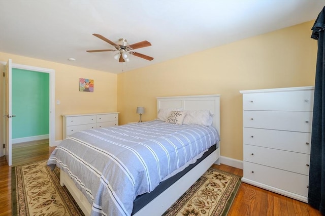 bedroom featuring ceiling fan and wood-type flooring