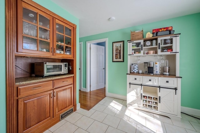 interior space featuring light tile patterned floors