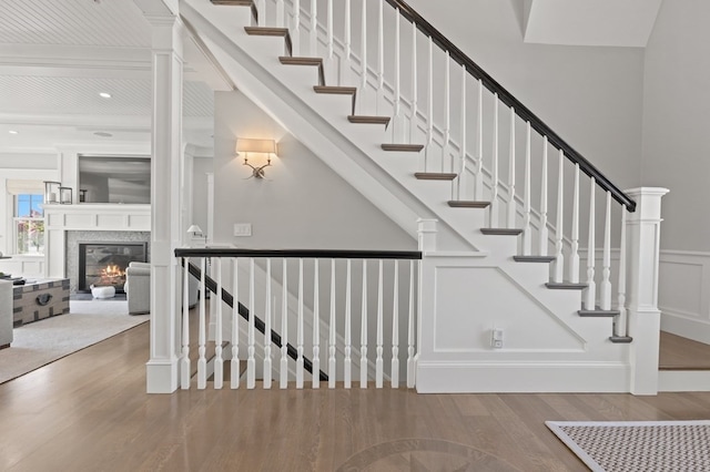 stairway featuring wood-type flooring