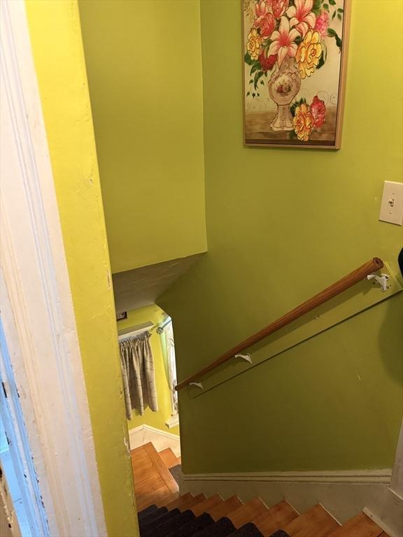 12 Graves Ave, Lynn, MA 01902 - stairs featuring baseboards