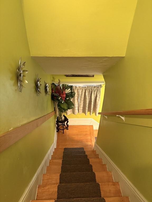 12 Graves Ave, Lynn, MA 01902 - stairs with wood finished floors and baseboards