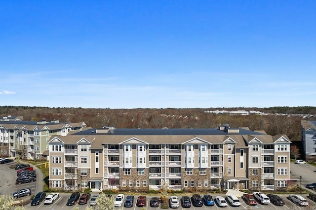 110 Trotter Rd Unit 104, Weymouth, MA 02190 - view of apartment building / complex with uncovered parking
