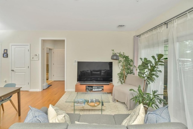 110 Trotter Rd Unit 104, Weymouth, MA 02190 - living room with wood finished floors and baseboards