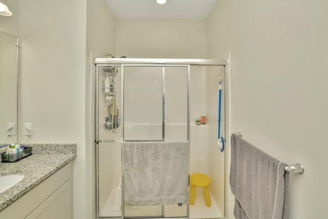 110 Trotter Rd Unit 104, Weymouth, MA 02190 - bathroom featuring vanity and a shower stall