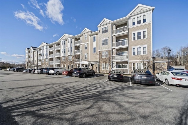 110 Trotter Rd Unit 104, Weymouth, MA 02190 - view of apartment building / complex featuring uncovered parking