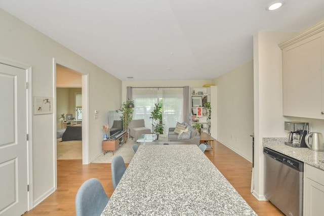 110 Trotter Rd Unit 104, Weymouth, MA 02190 - kitchen featuring dishwasher and light wood-style floors