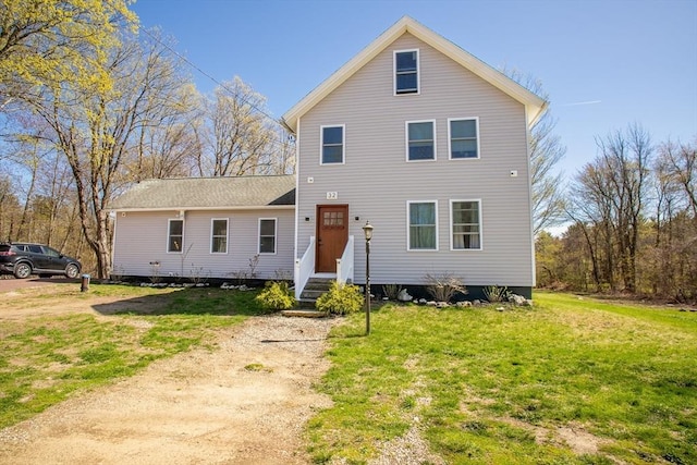 32 Leverett Rd, Shutesbury, MA 01072 - traditional home with entry steps and a front lawn