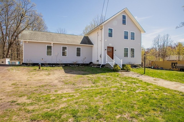 32 Leverett Rd, Shutesbury, MA 01072 - view of front of home with entry steps and a front yard