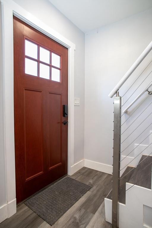 32 Leverett Rd, Shutesbury, MA 01072 - entrance foyer with dark wood-style flooring and baseboards