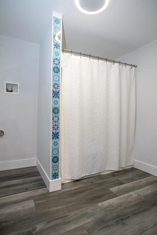 32 Leverett Rd, Shutesbury, MA 01072 - bathroom with wood finished floors and baseboards