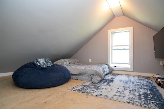 32 Leverett Rd, Shutesbury, MA 01072 - bedroom featuring vaulted ceiling, wood finished floors, and baseboards