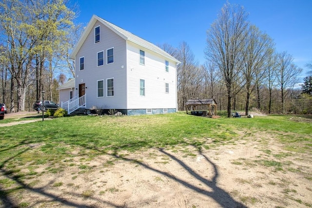 32 Leverett Rd, Shutesbury, MA 01072 - view of home's exterior featuring a lawn
