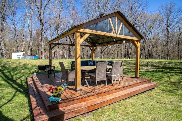 32 Leverett Rd, Shutesbury, MA 01072 - deck with outdoor dining area, a gazebo, and a yard