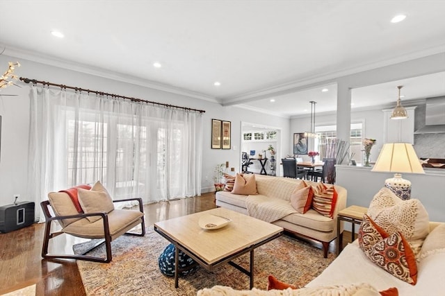 44 Sunset Ridge Ln Unit 44, Bolton, MA 01740 - living area featuring wood finished floors, recessed lighting, ornamental molding, and baseboards