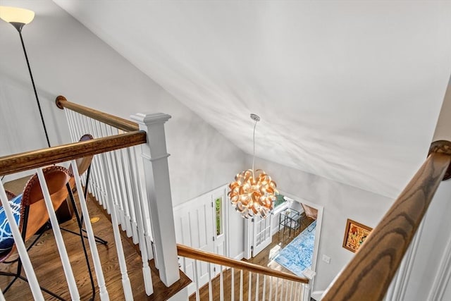 44 Sunset Ridge Ln Unit 44, Bolton, MA 01740 - stairway featuring vaulted ceiling, wood finished floors, and a chandelier