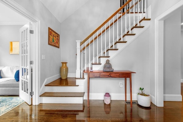44 Sunset Ridge Ln Unit 44, Bolton, MA 01740 - stairs featuring wood finished floors, vaulted ceiling, and baseboards