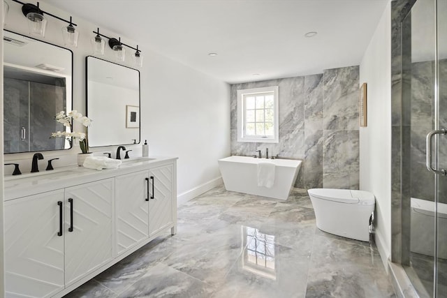 bathroom featuring a shower stall, toilet, marble finish floor, and a sink