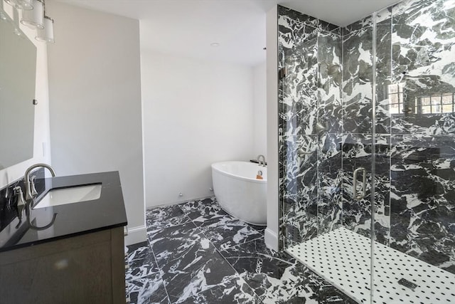 bathroom featuring a shower stall, baseboards, a soaking tub, marble finish floor, and vanity