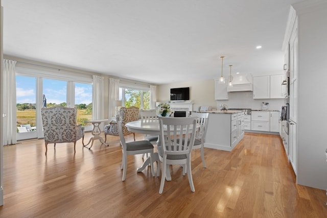 dining area with light wood-type flooring