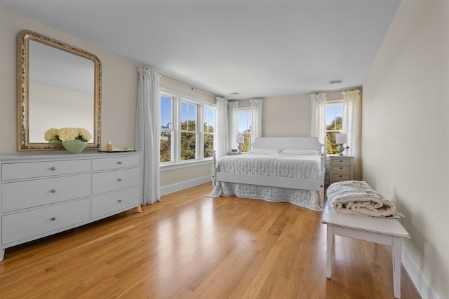 bedroom featuring light wood-type flooring