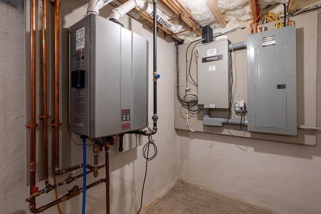 utility room featuring tankless water heater and electric panel