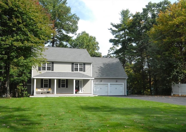 9 Pine Grove Rd, Westford, MA 01886 - view of front of home featuring a shingled roof, a front lawn, a garage, a porch, and driveway