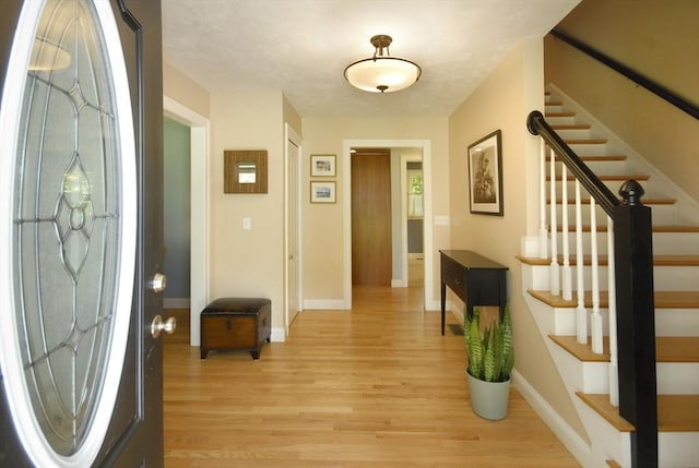 9 Pine Grove Rd, Westford, MA 01886 - foyer with baseboards, stairs, and light wood finished floors