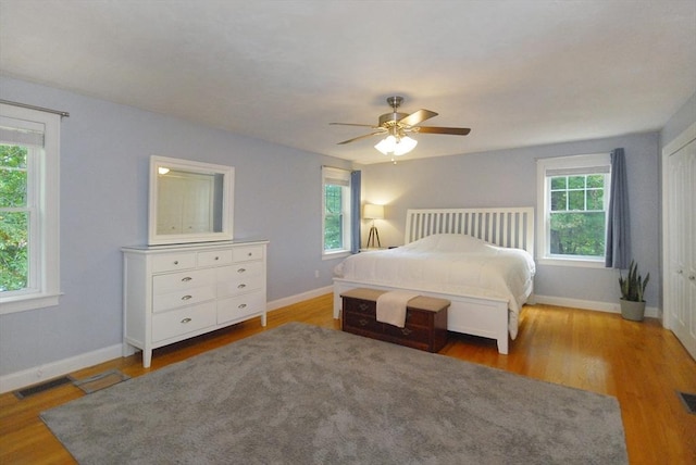 9 Pine Grove Rd, Westford, MA 01886 - bedroom featuring baseboards, wood finished floors, and visible vents