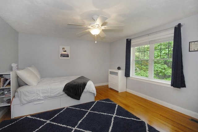 9 Pine Grove Rd, Westford, MA 01886 - bedroom with baseboards, ceiling fan, wood finished floors, and visible vents