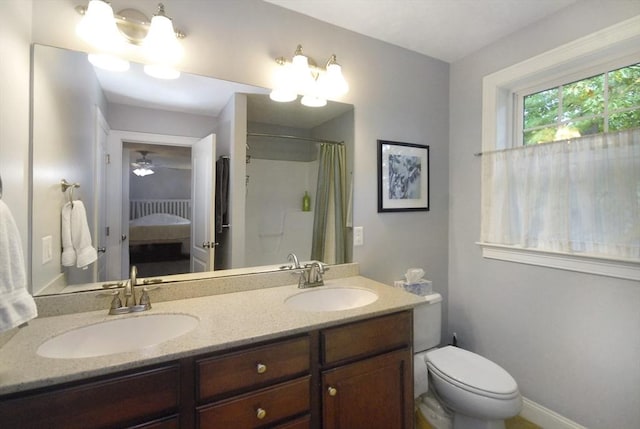 9 Pine Grove Rd, Westford, MA 01886 - ensuite bathroom with double vanity, toilet, a sink, and ensuite bathroom