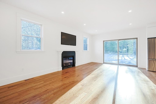 living room with light hardwood / wood-style floors