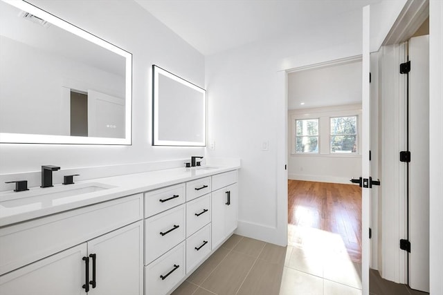 bathroom featuring tile patterned floors and vanity