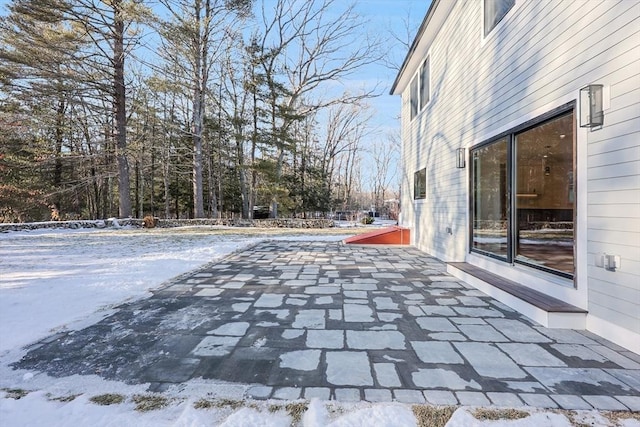 view of snow covered patio