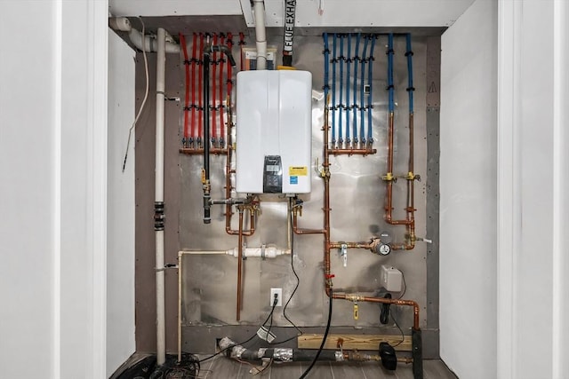 utility room with water heater