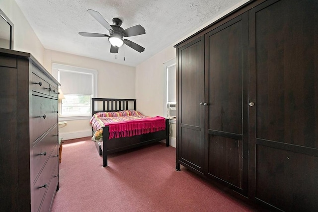 78/80 Curtis Ave, Quincy, MA 02169 - bedroom with dark carpet, a ceiling fan, a textured ceiling, and cooling unit