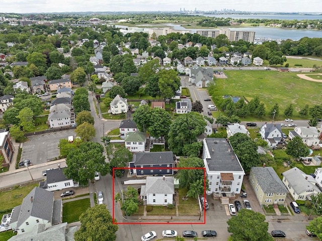78/80 Curtis Ave, Quincy, MA 02169 - aerial perspective of suburban area with property boundaries highlighted and a nearby body of water