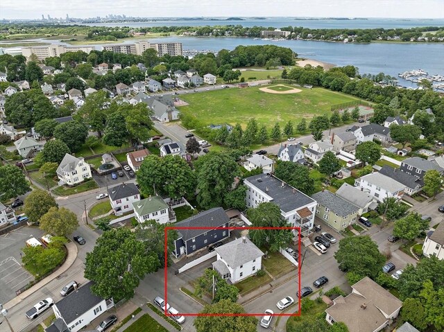 78/80 Curtis Ave, Quincy, MA 02169 - aerial view of residential area featuring property parcel outlined and a large body of water