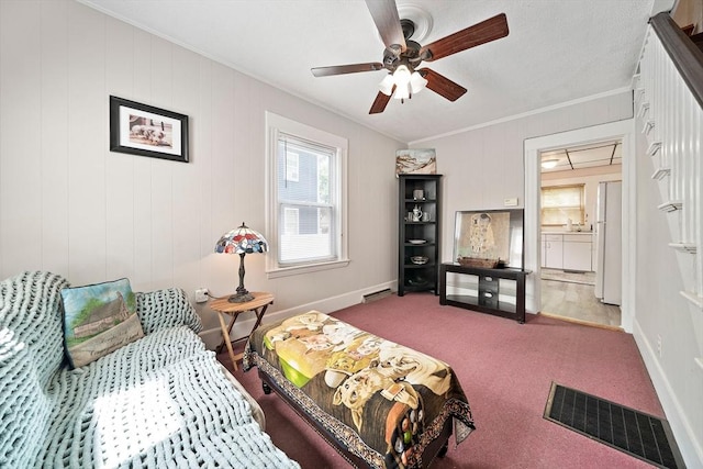 78/80 Curtis Ave, Quincy, MA 02169 - carpeted bedroom featuring crown molding, freestanding refrigerator, and ceiling fan