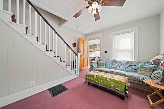 78/80 Curtis Ave, Quincy, MA 02169 - carpeted living area with stairs and a ceiling fan