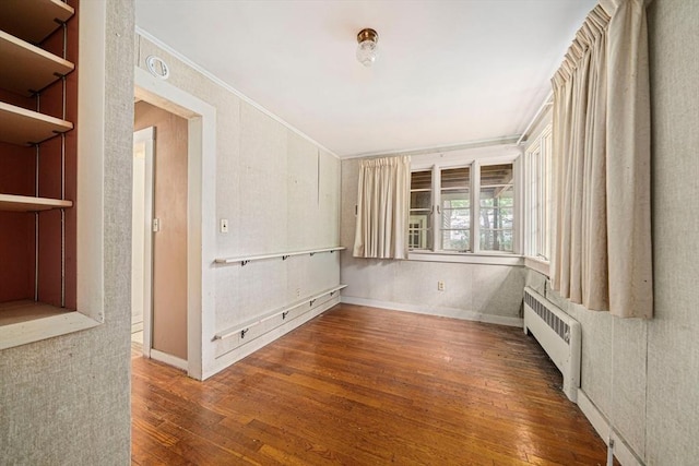 36 Grove St, Hanover, MA 02339 - unfurnished room with hardwood / wood-style floors, crown molding, and radiator heating unit
