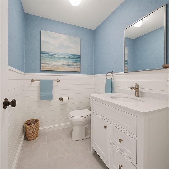 36 Grove St, Hanover, MA 02339 - half bath featuring vanity, tile patterned flooring, and wainscoting