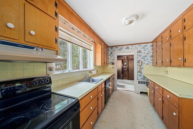 36 Grove St, Hanover, MA 02339 - kitchen featuring black appliances, under cabinet range hood, wallpapered walls, tasteful backsplash, and light countertops